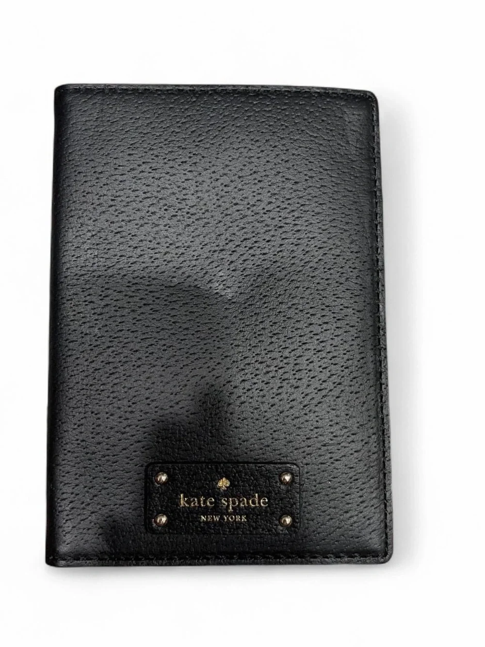kate spade Black Pebbled Leather Passport Cover with Gold Plaque